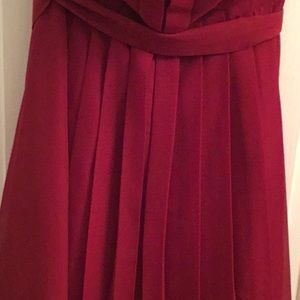 New red strapless pleated dress